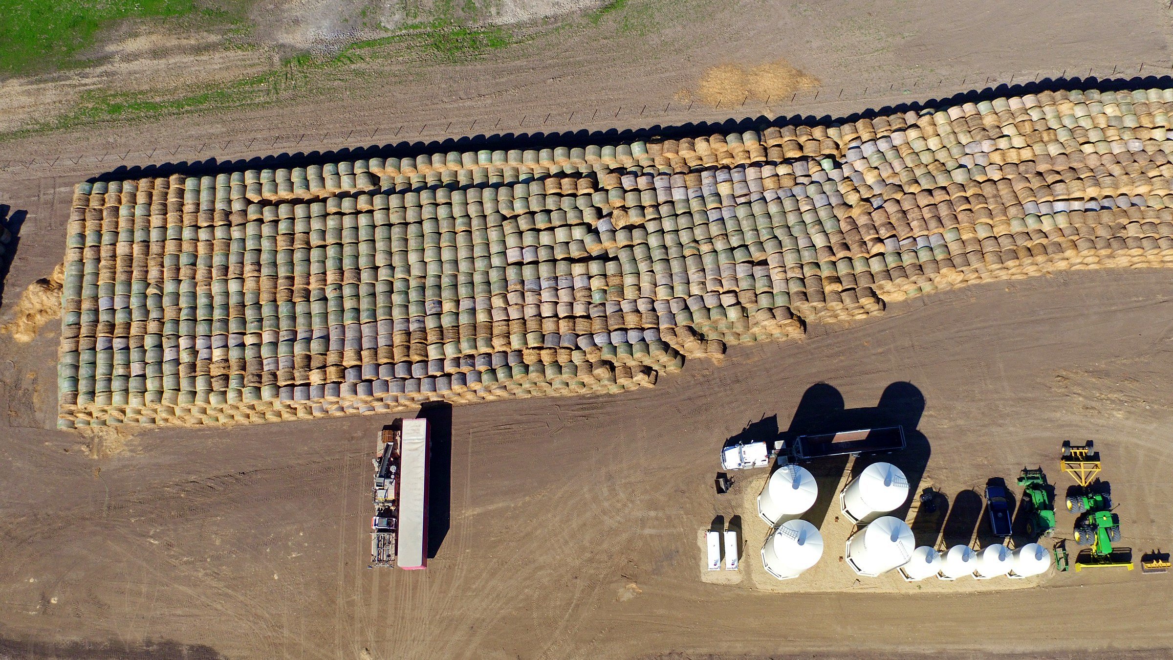 The season's silage in bags at the feedlot, from the air