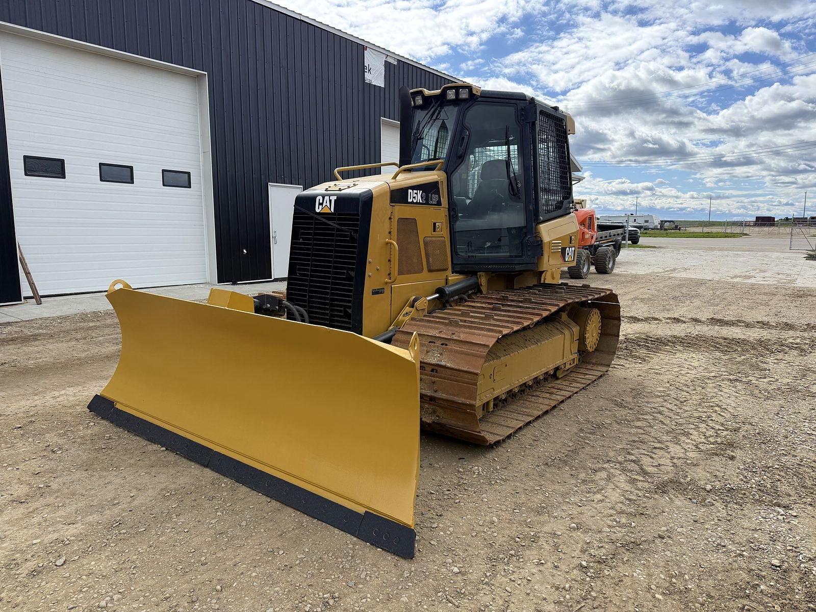 The group's Caterpillar D5K2 LGP dozer at the shop