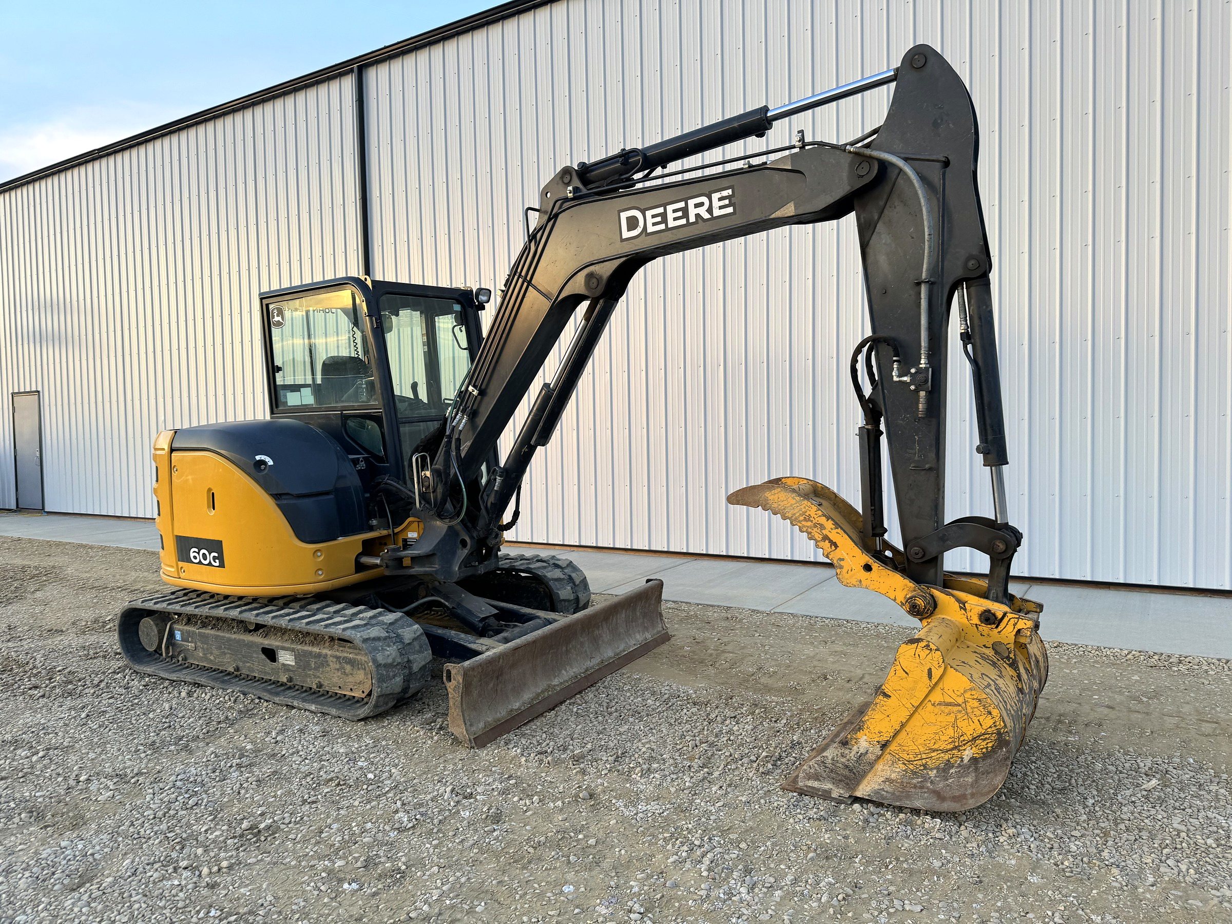 The group's John Deere 60G mini excavator at the shop