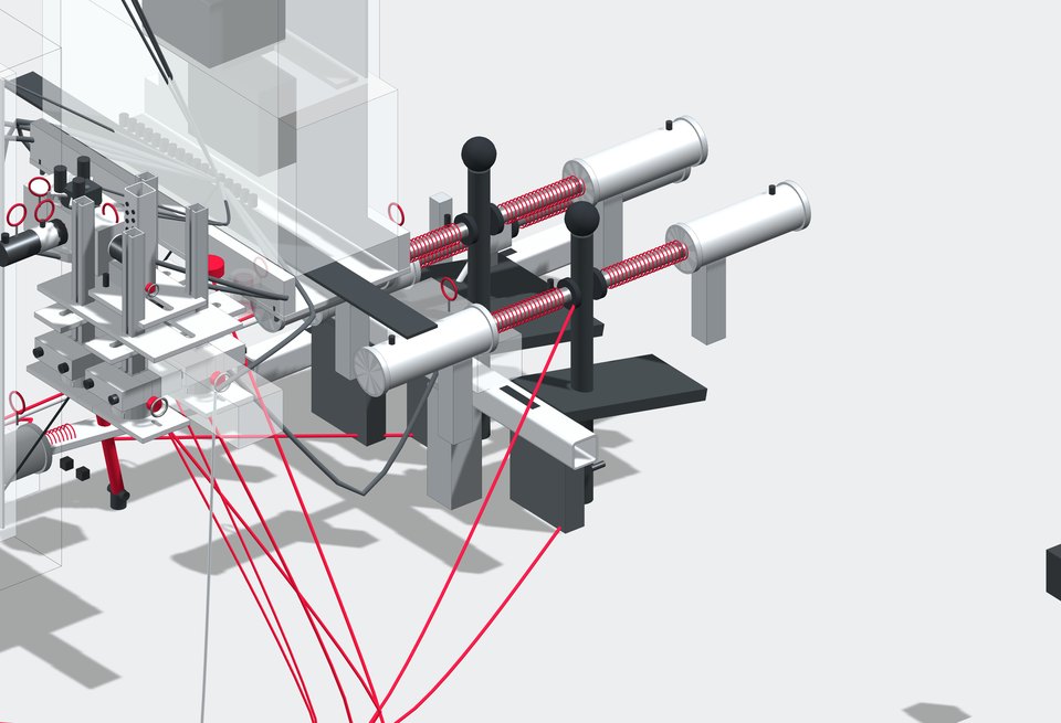 Render of the travel pod on an excavator's travel levers: actuators with red return springs, black posts with ball ends gripping the levers, grey framing